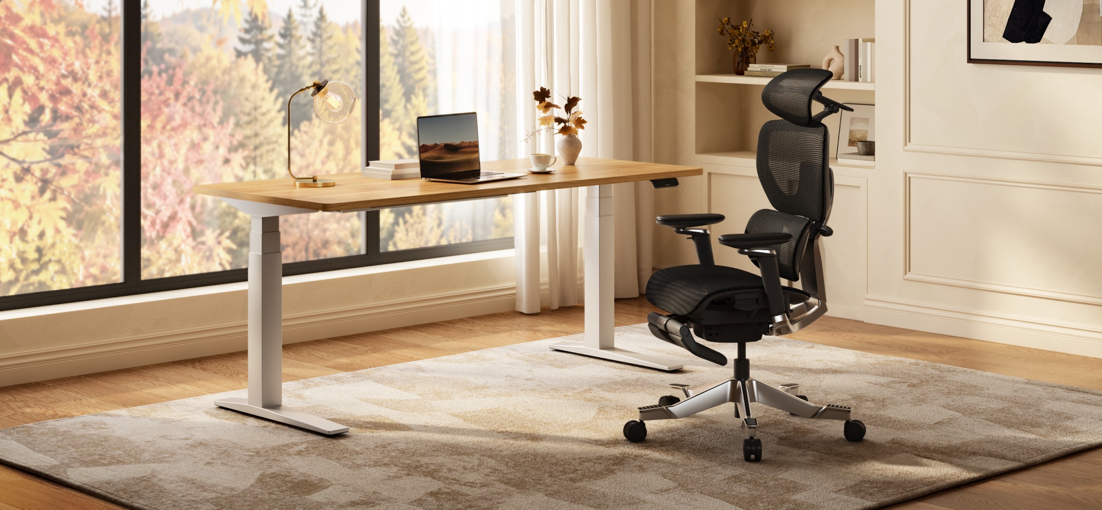 Adjustable standing desk with a natural wood surface and white frame paired with an ergonomic black office chair in a bright home office setting.