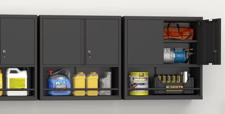 Wall-mounted black metal storage cabinets with lockable doors, showcasing organized tools, cleaning supplies, and motor oil containers on shelves.